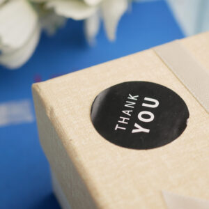 black vinyl label on product packaging