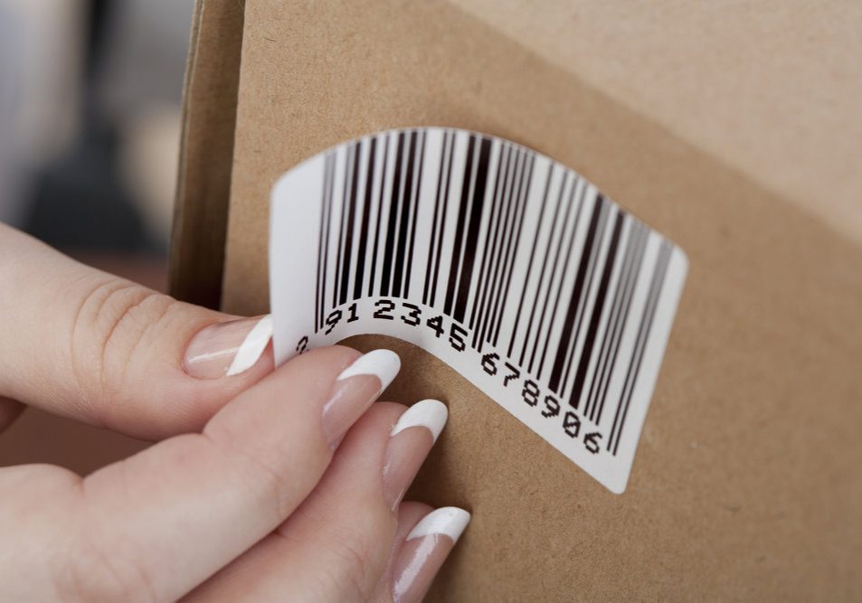 Sticky barcode label on the box. Close up. All about bar-codes in my lightbox: